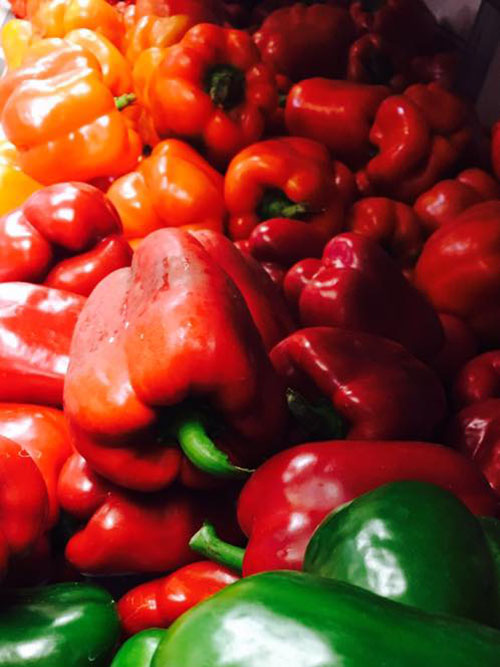 red green and orange peppers